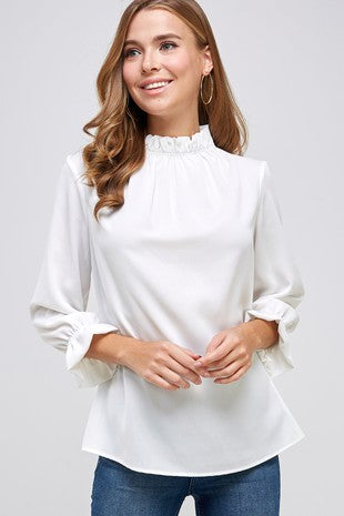 3/4 sleeve Blouse Top with ruffle neckline. top Back pearl button.